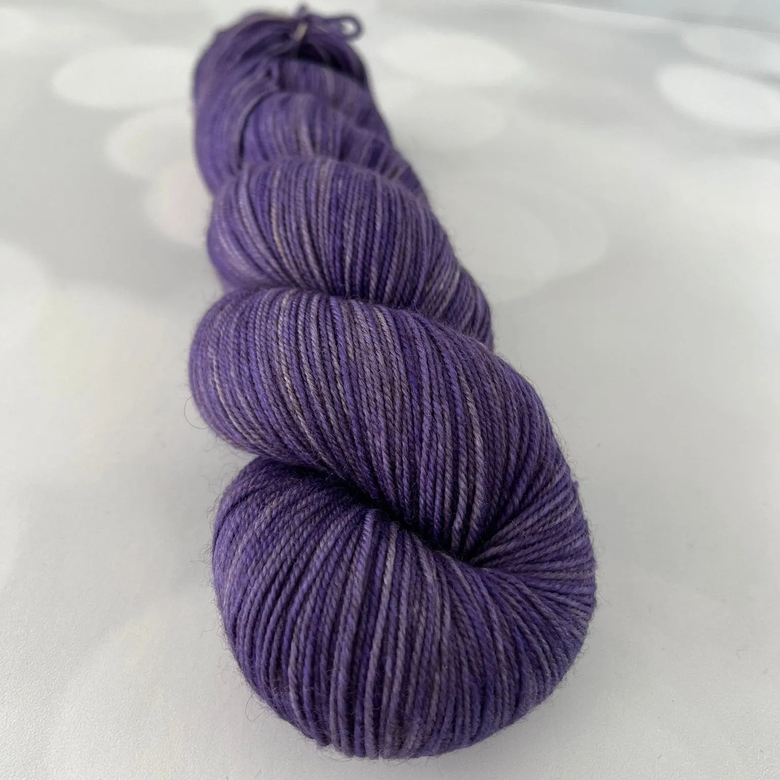 Amethysts in the Abyss, Treasured Yak Toes Sock Yarn, lilac purple violet yarn