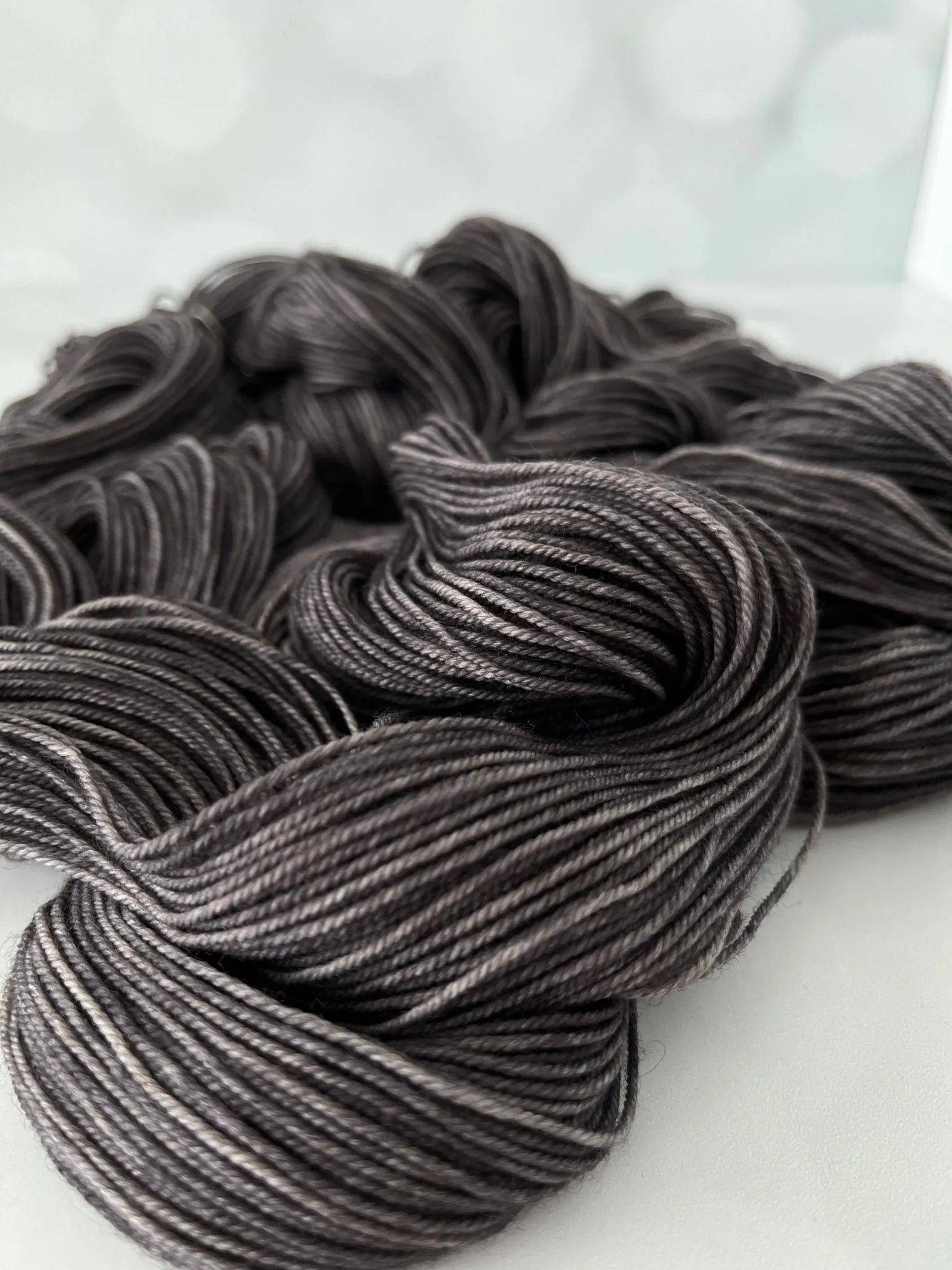 Gunpowder, Treasured Yak Toes Sock Yarn, dark charcoal gray yarn