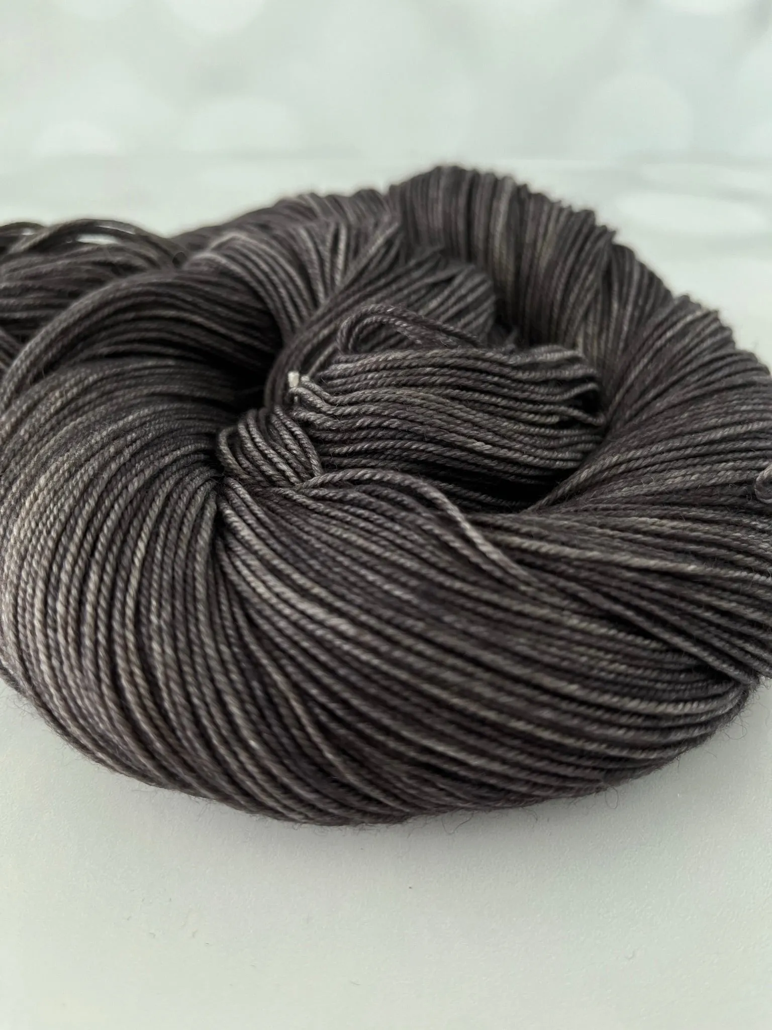 Gunpowder, Treasured Yak Toes Sock Yarn, dark charcoal gray yarn