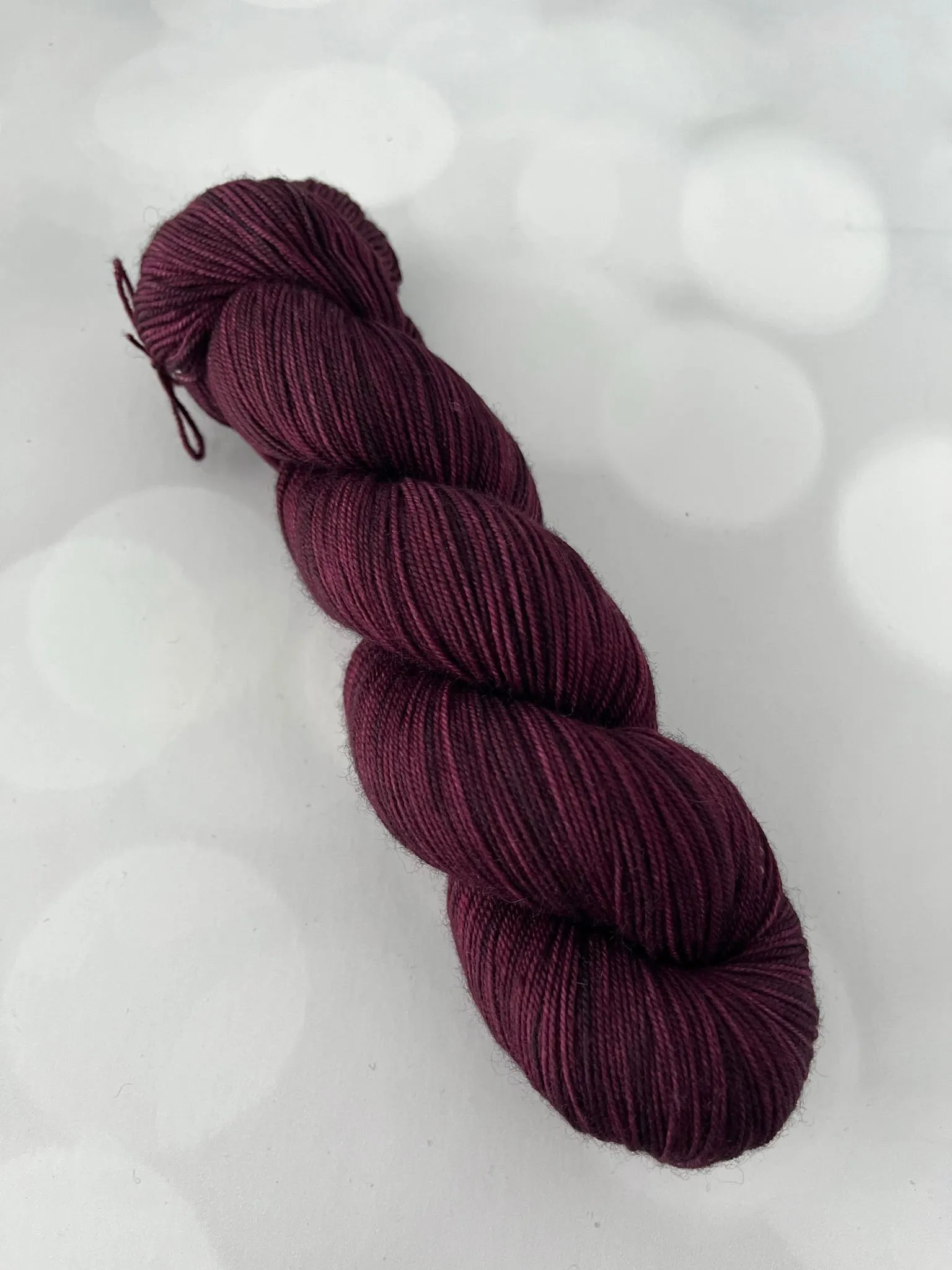 Song of the Sirens, Treasured Yak Toes Sock Yarn, magenta wine yarn