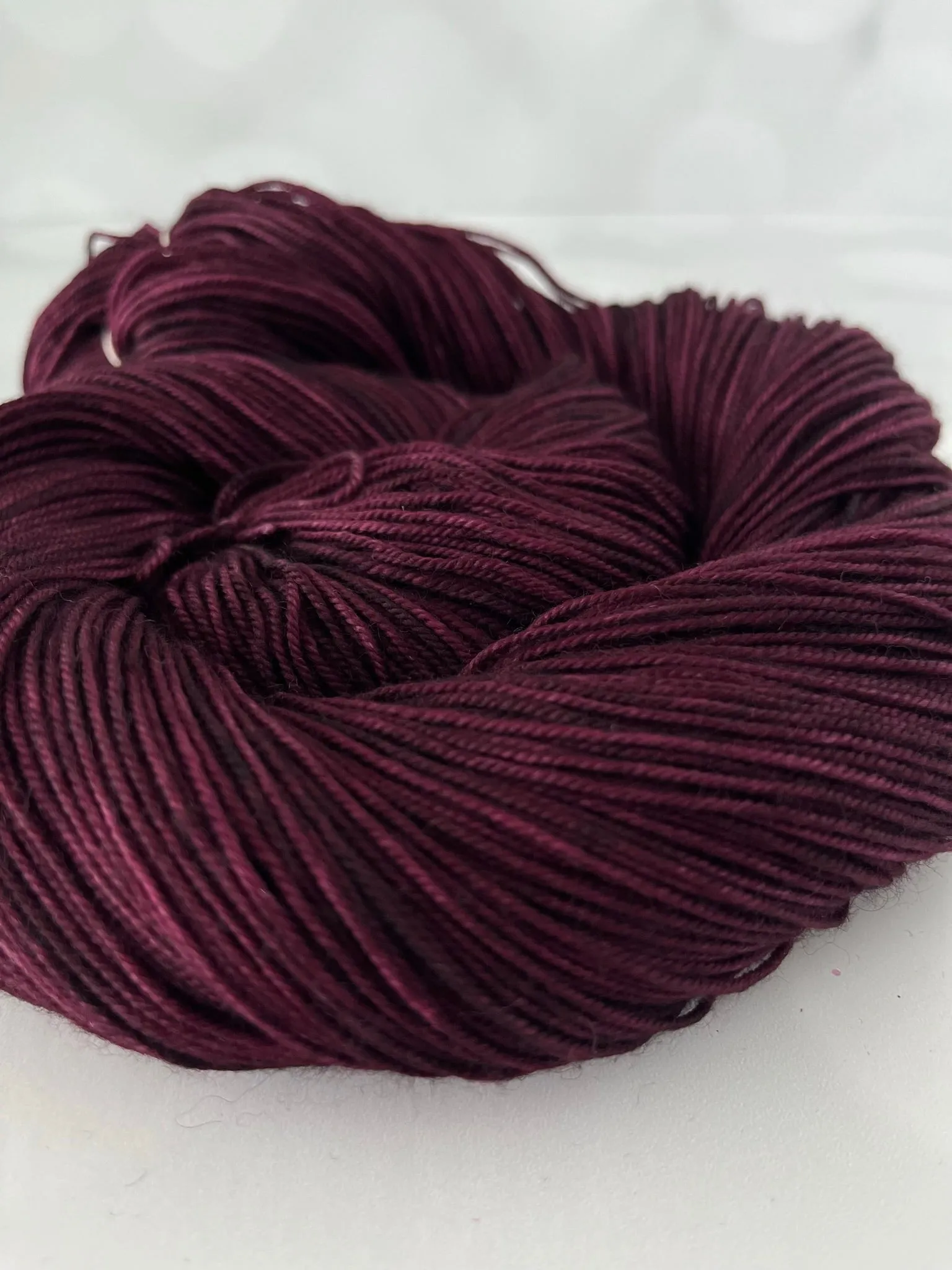 Song of the Sirens, Treasured Yak Toes Sock Yarn, magenta wine yarn