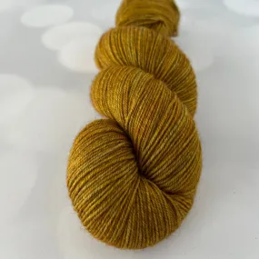 Tarnished Brass, Treasured Yak Toes Sock Yarn, goldenrod yellow yarn