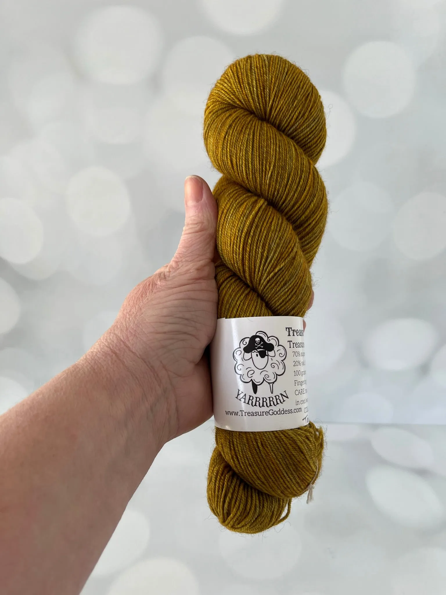 Tarnished Brass, Treasured Yak Toes Sock Yarn, goldenrod yellow yarn